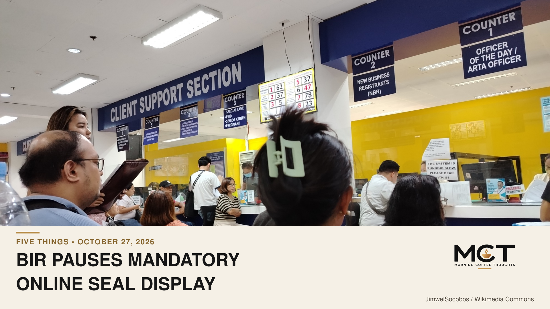 People wait beside client-support and new-business-registration counters at BIR RDO 113A in a photograph dated June 4, 2025. Illustrative office scene, not the October 2026 seal-display suspension announcement.