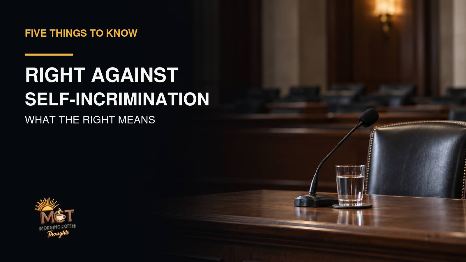 An empty witness chair and microphone in a hearing room.