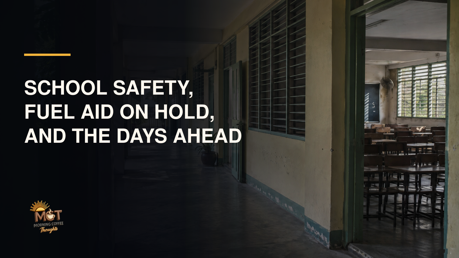 An empty school corridor with classrooms visible.